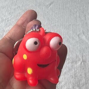 Free with purchase! Red Monster Keychain